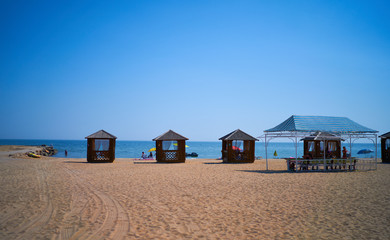 beach houses stand by the sea