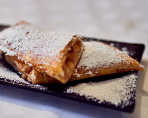 strudel lies on a plate on the table