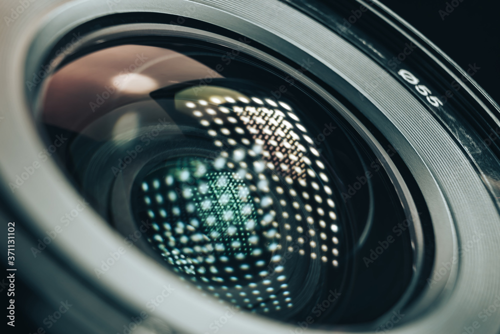 Fototapete beautiful camera lens with light reflection background pattern for design.