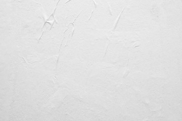 Blank white crumpled and creased paper poster texture background