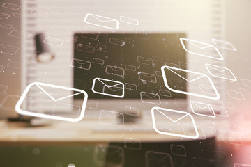 Double exposure of postal envelopes hologram on laptop background. Electronic mail and spam concept