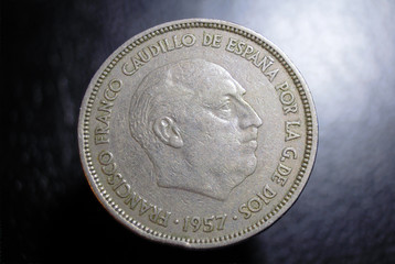 Reverse of Spanish 25 peseta coin 1957, made from Copper-Nickel. Displaying the head of Francisco franco