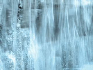 Blurred stream of water. Beautiful view of flowing water