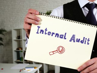 Business concept meaning Internal audit with inscription on the page.