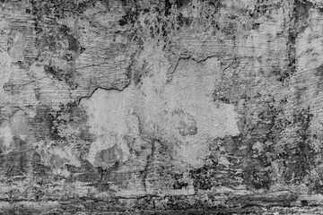 Obraz premium Grunge cracked black concrete wall, Old black cement wall with peeling plaster.