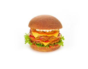 Double burger with lettuce, tomato, onion, and melted cheese on white background