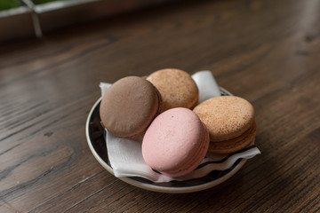 macaroons on wooden table. macaroons on wooden background
