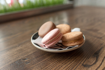 macaroons on wooden table. macaroons on wooden background
