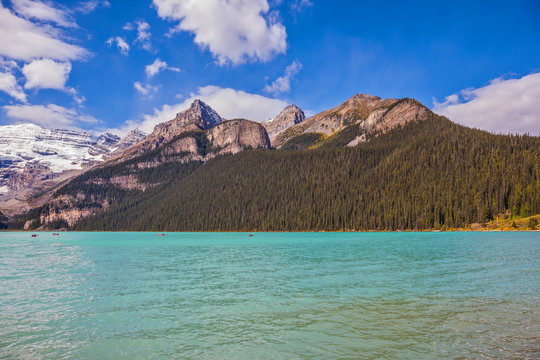 Magnificent Lake Louise, pine forests and glaciers