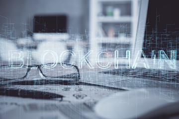 Crypto theme hologram with glasses on the table background. Concept of blockchain. Double exposure.