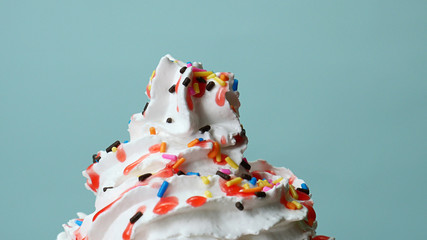 Close up Sweet candy full many colors on Whip cream, Food concept Front view..