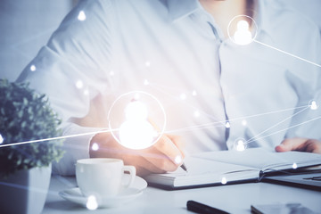 Man's hands working with notes background. Social networking scheme . Mixed media