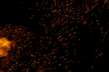 flame of fire with sparks on a black background