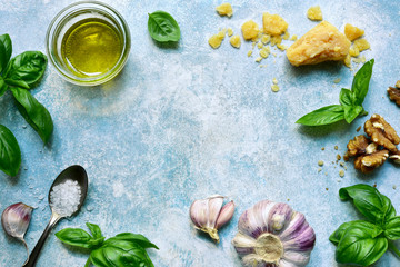 Fresh ingredients for making traditional italian pesto sauce from basil and cheese. Top view with...