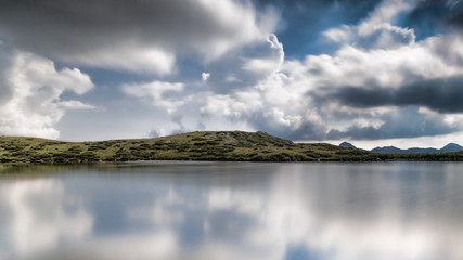 Between heaven and Earth, Italian mountain lake