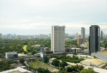 Naklejka na ściany i meble Manila, Philippines - August 12 2020: Manila skyline cityscape shot wide angle. 
