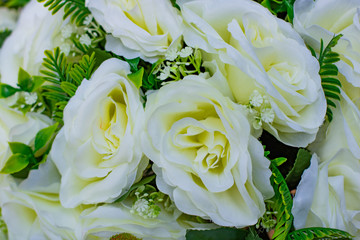 Bouquet of white roses with green tails