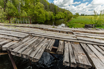 wooden bridge over the river