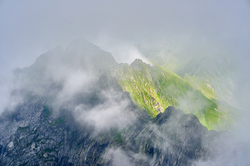 Obraz premium Misty mountains and hiking trail