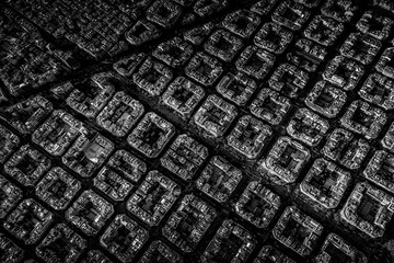 Aerial view of typical buildings of Barcelona cityscape from helicopter. in black and white. fine...