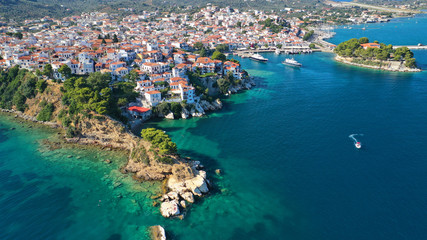 Aerial drone panoramic photo of picturesque main town of Skiathos island featuring small landmark...