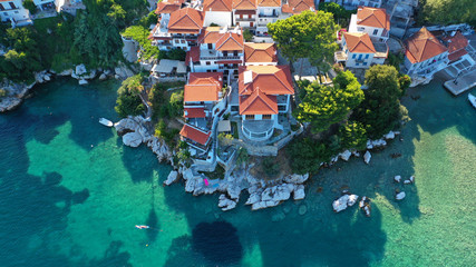 Aerial drone photo of picturesque small beach of Plakes in main village of Skiathos island,...