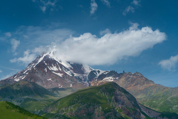 Fototapeta premium Kazbegi Peak and Glacier, Kazbegi Reserve, Georgian Military Highway, Mtskheta-Mtianeti Region, Georgia, Middle East