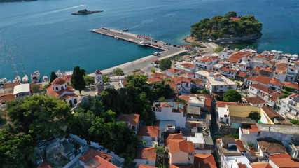 Aerial drone panoramic photo of picturesque main town of Skiathos island featuring small landmark...