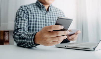 Searching Browsing Internet Data Information with blank search bar.businessman working with smart phone, tablet and laptop computer on desk in office. Networking Concept