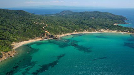 Aerial drone photo of paradise twin beaches of Mandraki and Elia in island of Skiathos island, Sporades, Greece
