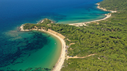 Aerial drone photo of paradise twin beaches of Mandraki and Elia in island of Skiathos island, Sporades, Greece