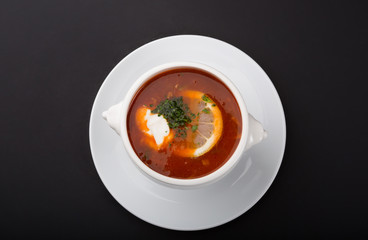 Traditional russian meat solyanka soup