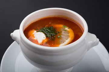 Traditional russian meat solyanka soup