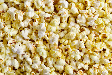 top view of butter popcorn texture background
