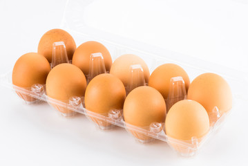Close-up of fresh eggs on the white background