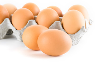Close-up fresh eggs on the bright table