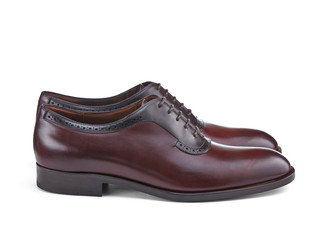 Light men's shoes made of thin patent brown leather. Side view.