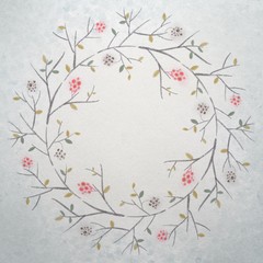 A wreath of branches with berries and leaves painted with watercolor strokes. Copy space inside a round frame. Social media template.