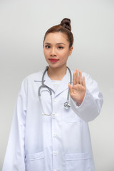 Healthcare and medicine concept - smiling female doctor