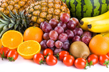 many kinds of fruits on a bright background, such as apples, bananas, pineapples, oranges, etc