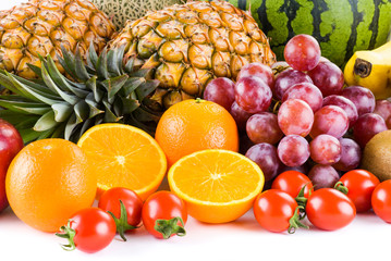Many kinds of fruits on a bright background, such as apples, bananas, pineapples, oranges, etc.