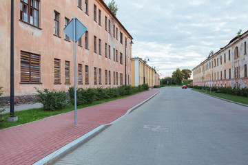 Naklejka premium City Daugavpils, Latvia. Old castle and ruins from red brick. Travel photo.