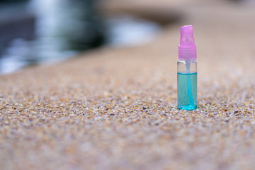 pink nail polish on a blue background
