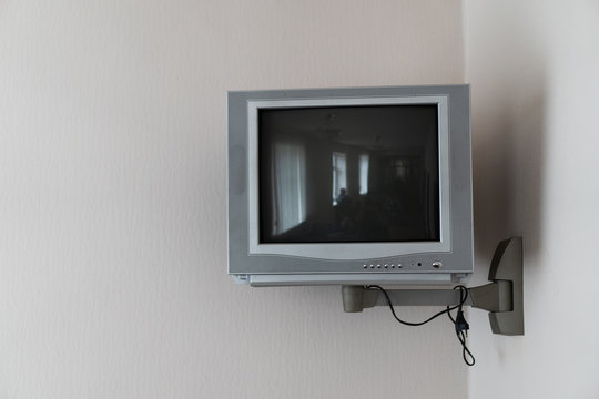TV with picture tube mounted on the wall