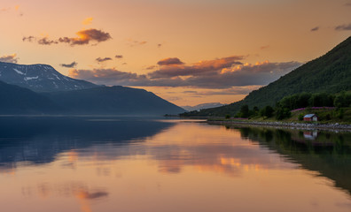 Fototapeta premium Mountain coast landscape at sunset, Norway