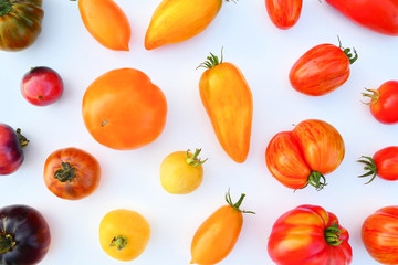 Colorful heirloom tomatoes background.