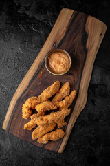 Shrimp or chicken fillet in batter. Crispy delicious seafood beer snack.