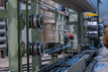Naklejka premium Conveyor belt for the production of plastic line. Waste processing plant. Technological process. Recycling and storage of waste for further disposal. Business for plastic recycling.