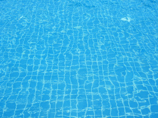 blue swimming pool with water wave