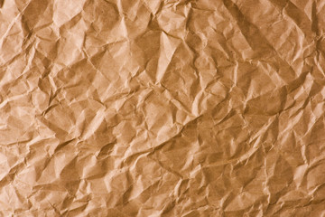 brown crumpled Kraft paper background. 